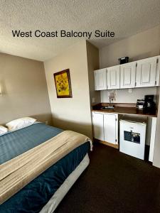 Kuchyň nebo kuchyňský kout v ubytování West Coast Motel on the Harbour