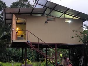 a house being built on top of a structure at Villalu. in Cahuita