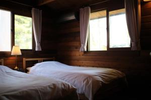 Säng eller sängar i ett rum på Renesto aHOLIDAYHOME - Vacation STAY 27907v
