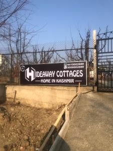 a sign for a libraryctr at Hideaway Cottages , Tangmarg in Tangmarg