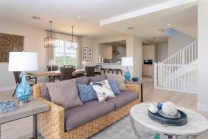 a living room with a couch and a table at The Shore House 4br-4,5ba in Key Largo