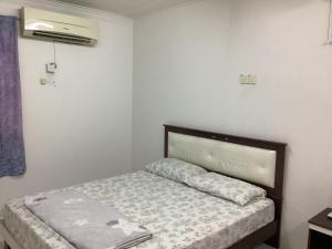 Postel nebo postele na pokoji v ubytování 4 Bedrooms Ipoh Landed House, Ipoh Town