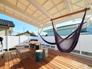 A balcony or terrace at Surf&Turf Aoshima - サーフ&ターフ青島 -