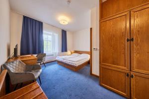 Postel nebo postele na pokoji v ubytování Hotel Auri