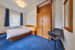 Postel nebo postele na pokoji v ubytování Hotel Auri