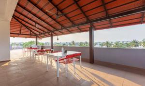 Balkón nebo terasa v ubytování Treebo Samanvaya Retreat, Mysore
