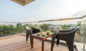 Balkón nebo terasa v ubytování Treebo Samanvaya Retreat, Mysore