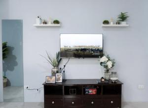 A television and/or entertainment centre at Condo near Calle Crisologo