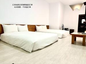 Postelja oz. postelje v sobi nastanitve Nanwan254 Homestay