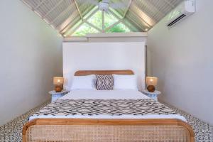 Ένα ή περισσότερα κρεβάτια σε δωμάτιο στο Private 5 Bedroom Spacious Villa Close to Sanur Beach