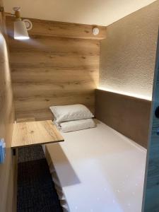 Ліжко або ліжка в номері AQ Capsule Hostel