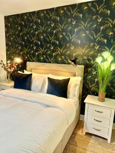 Ένα ή περισσότερα κρεβάτια σε δωμάτιο στο Blush Jungle - Homestay