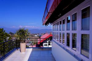 Балкон или тераса в The Dharmas Resort