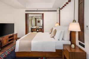 Voodi või voodid majutusasutuse Varnabas Museum Hotel toas