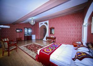 Postel nebo postele na pokoji v ubytování ORIYO DUSHANBE HOTEL