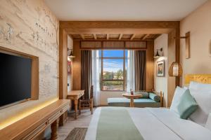 Voodi või voodid majutusasutuse Varnabas Museum Hotel toas