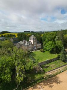 an aerial view of a house in the countryside at Le Domaine de Linars - L'Aile du Château in Le Truel