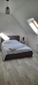 Postel nebo postele na pokoji v ubytování La Maison Enzo