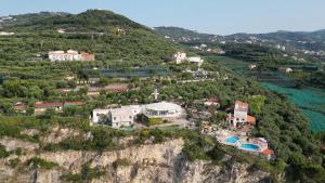 an aerial view of a house on a cliff at Villaggio Villa Lubrense in Massa Lubrense