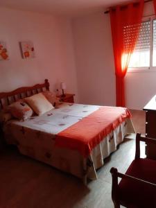 En eller flere senger på et rom på Apartment mit Bergblickterrasse bei Lloret de Mar