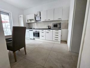 Η κουζίνα ή μικρή κουζίνα στο Work & Stay in Troisdorf