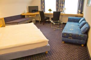 Postel nebo postele na pokoji v ubytování Hotel Krone