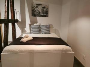 Postel nebo postele na pokoji v ubytování La Pomme du Président III