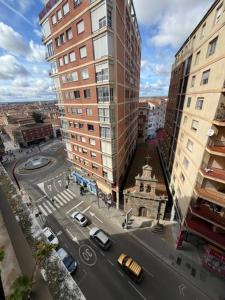 an aerial view of a city street with buildings at Piso SANTA MONICA Zamora in Zamora