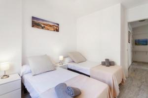 Posteľ alebo postele v izbe v ubytovaní Apartamento luminoso cuarteles by greensol homes