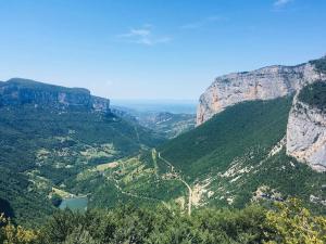 a view of a valley in the mountains at L'étable du Vercors in Saint-Agnan-en-Vercors