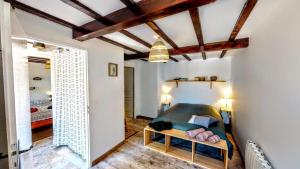 Postel nebo postele na pokoji v ubytování "L'or et des Landes" - 6 personnes - 5 minutes centre équestre et 10 minutes de Nérac