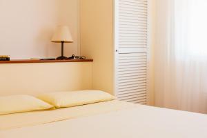 A bed or beds in a room at Residence Renaione