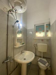 Koupelna v ubytování Dima Rooms And Apartments