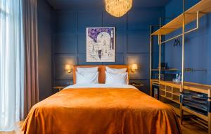 Postel nebo postele na pokoji v ubytování Zorba&Bond Boutique Hotel