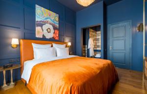 Postel nebo postele na pokoji v ubytování Zorba&Bond Boutique Hotel