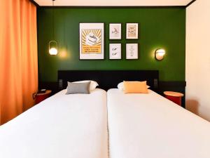 Voodi või voodid majutusasutuse ibis Styles Dijon Central toas