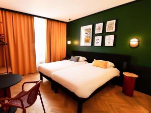 Voodi või voodid majutusasutuse ibis Styles Dijon Central toas