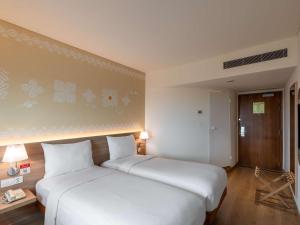ibis Navi Mumbai - An Accor Brand客房内的一张或多张床位