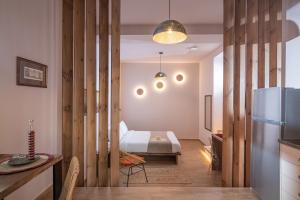 Postel nebo postele na pokoji v ubytování CARPE DIEM HOTEL