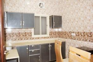 Kuchyň nebo kuchyňský kout v ubytování تميز الحمدانية للوحدات السكنية - Tamiz Al Hamdaniya Residential Units