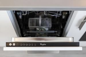a microwave oven sitting on top of a counter at NEW! Apartments with shared pool, Vodice in Vodice