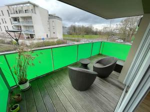 Pogled na bazen v nastanitvi Clotilde Appartement Rennes 70m2 oz. v okolici