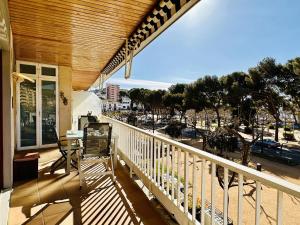 a balcony with a view of a city at Passeig CostaBravaSi in Sant Feliu de Guíxols