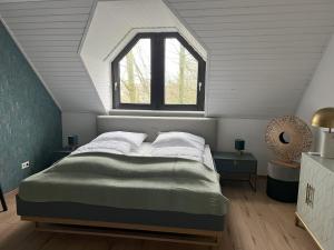 Letto o letti in una camera di Luxuswohnung in Niederkassel