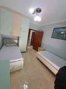 Postel nebo postele na pokoji v ubytování Apartament Miraka