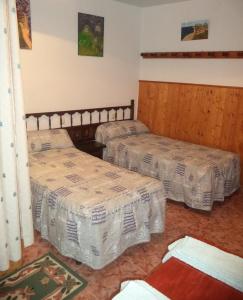 Un ou plusieurs lits dans un hébergement de l'établissement Casa Milagros