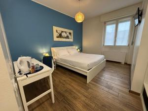 Postel nebo postele na pokoji v ubytování Airuno Rooms
