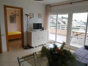 TV a/nebo společenská místnost v ubytování A H RENTALS Montemar 10 Apartamento Atalayas