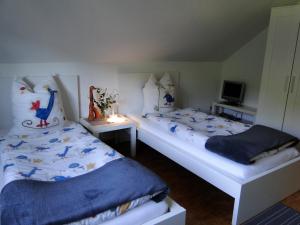 Postel nebo postele na pokoji v ubytování Ferienwohnung Hotte´s Hütte