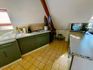 Η κουζίνα ή μικρή κουζίνα στο Home - Jean Jaurés - Séjour à Auxerre